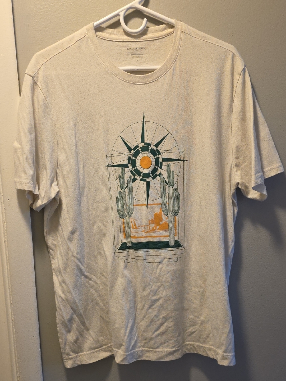 Desert Compass Graphic Tee — Cream with Green & Orange Print